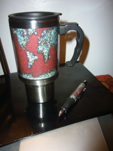 Final design in customizable mug and pen.
